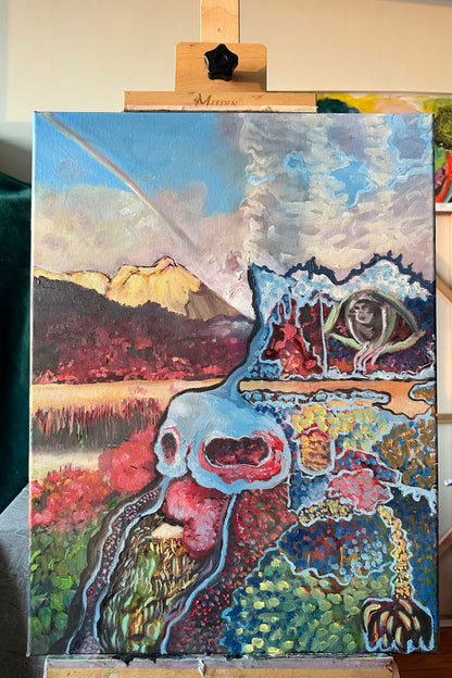Colorful abstract painting on an easel with a mountain and nature elements.