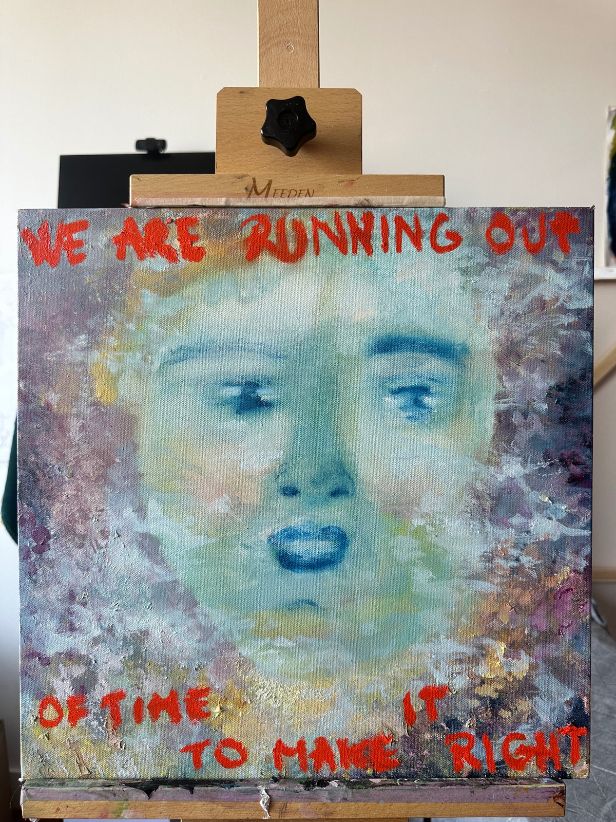 Artistic depiction of a face with text on an easel