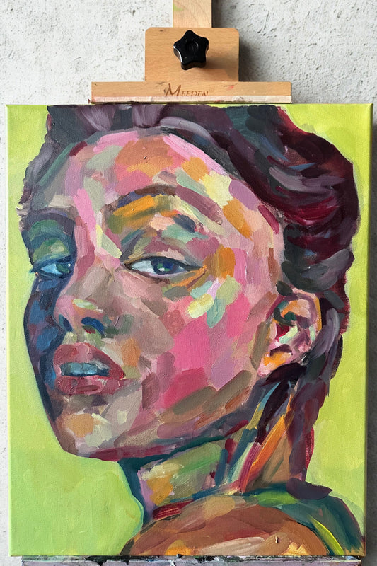 Colorful portrait painting on a green background