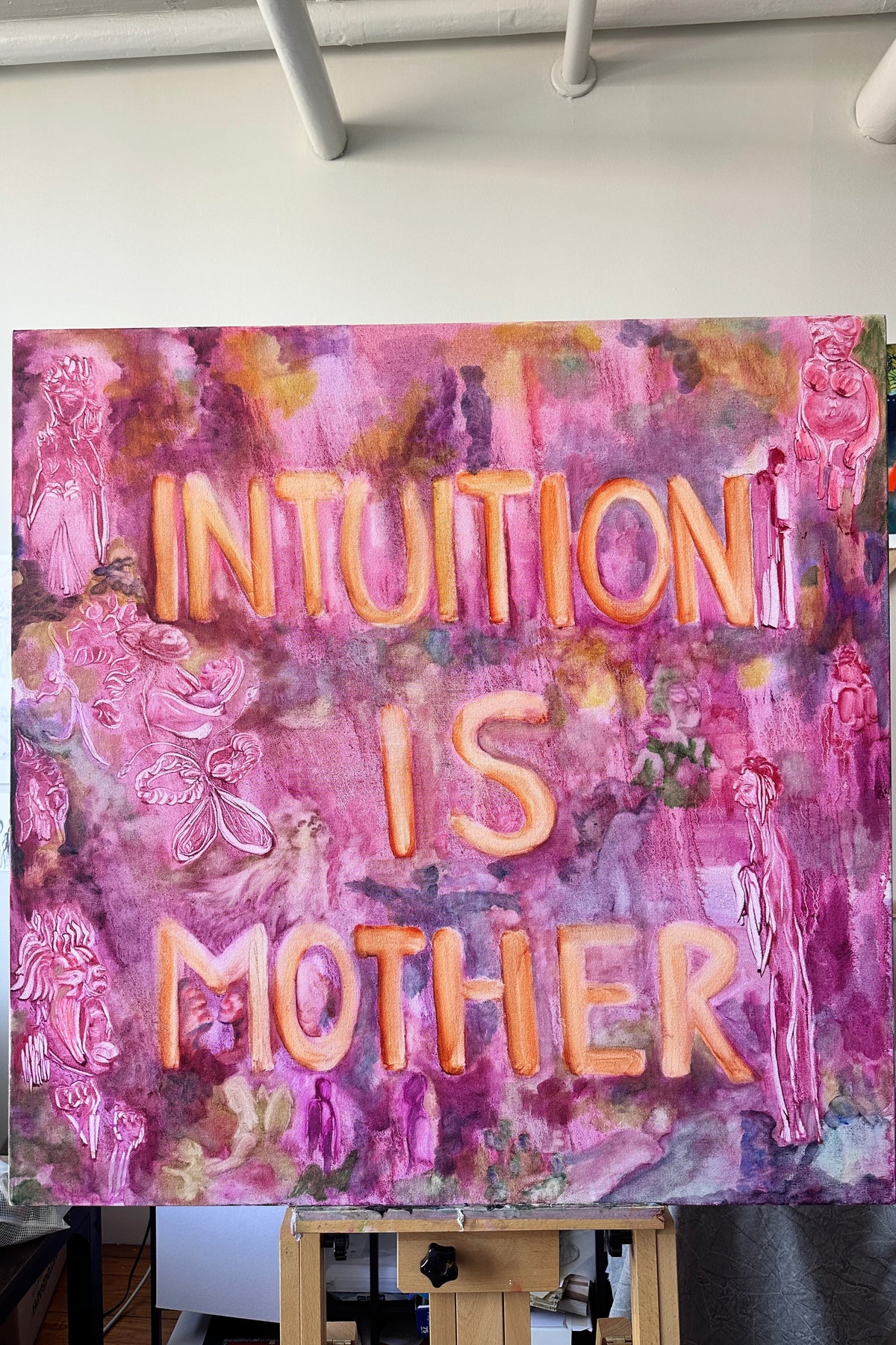 Artistic painting with text 'INTUITION IS MOTHER' on a pink and purple abstract background.