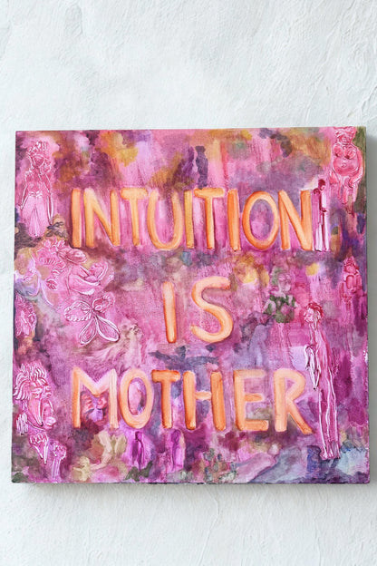 Pink and purple abstract painting with 'INTUITION IS MOTHERIER' text